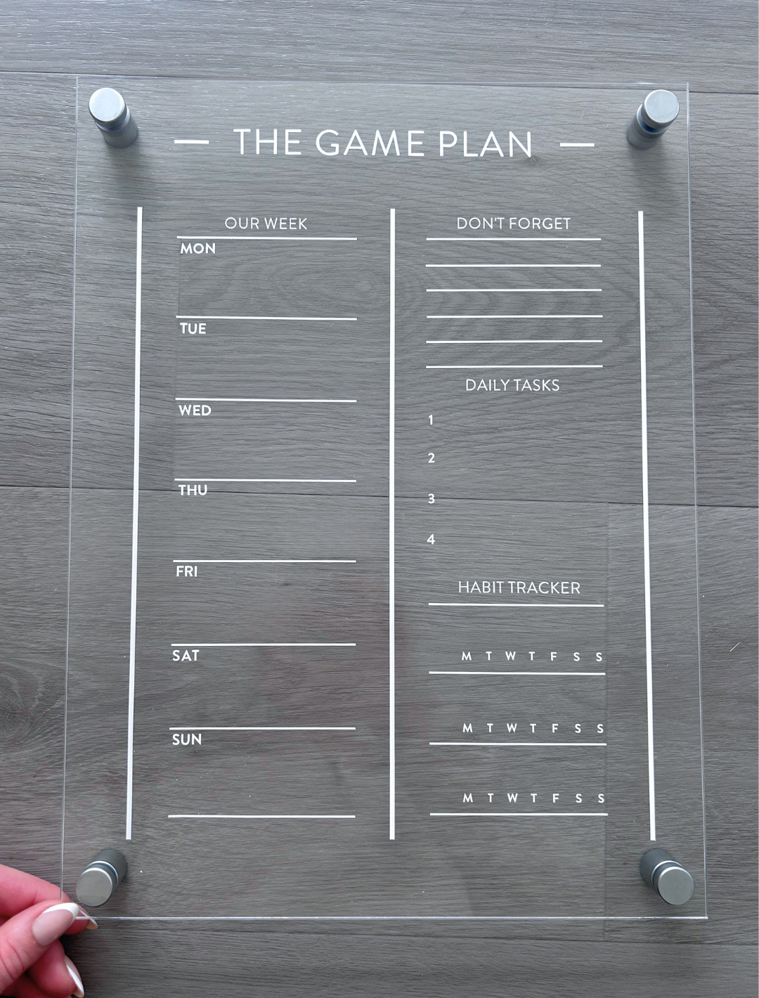 Kids acrylic fridge and wall planner. Game Plan with sections for weekly schedule, chores, daily tasks, and habit tracker to help children stay focused and organised